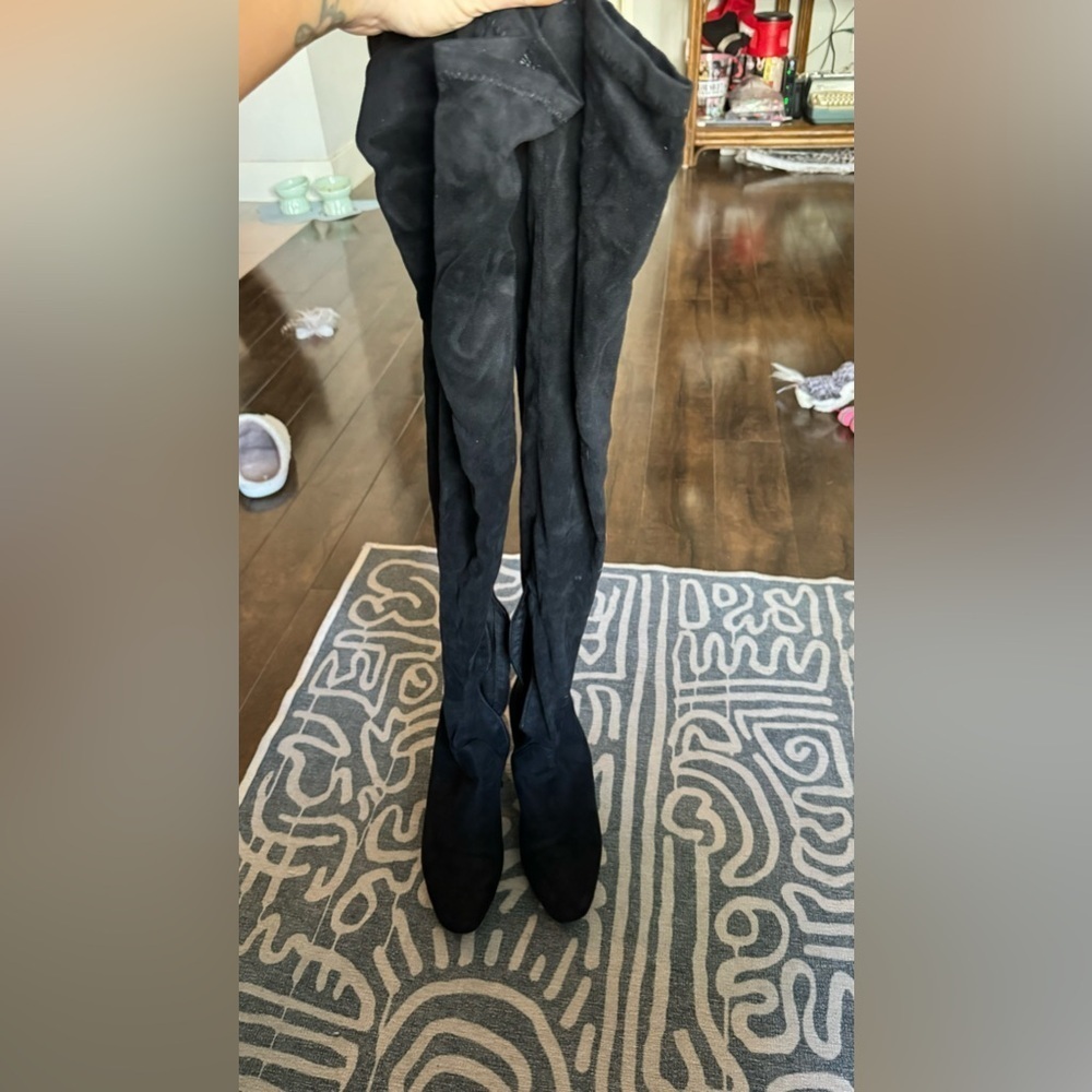 Knee high black suede boots
